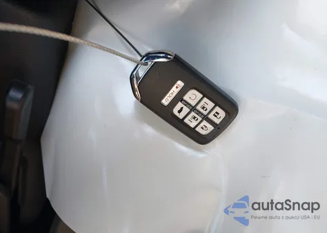 2023 Honda Odyssey Touring from USA, damaged, VIN 5FNRL6H89PB022277